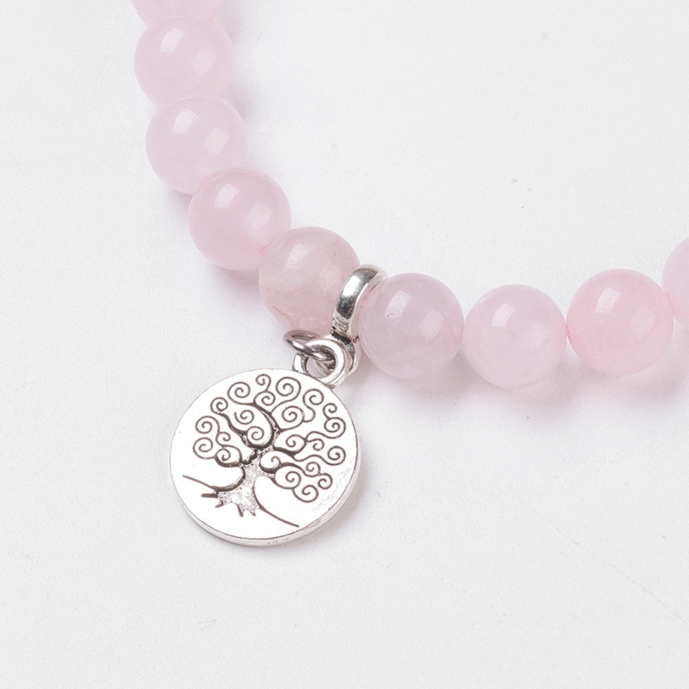 Baby Pink Rose Quartz Bracelet With 8mm Round Beads And Ohm Spacer Plus Tree Of Life Charm